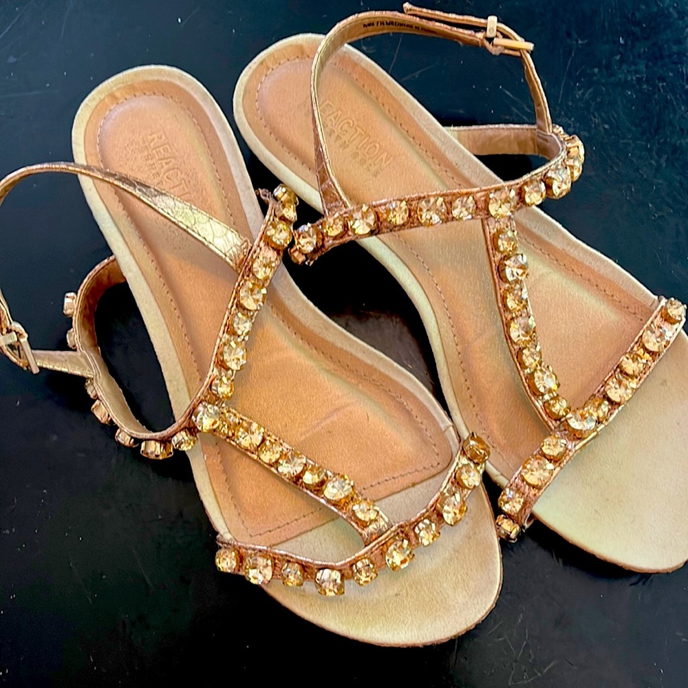Reaction Kenneth Cole flat sandals. 7 1/2. Copper colored straps and gems.